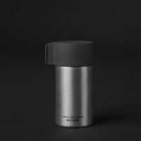 Back of canister on black background
