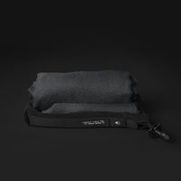 Rolled up towel on black background