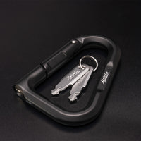 black betalock and 2 keys on black background