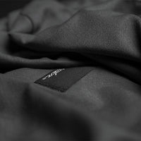 Close up view of charcoal beach towel nanodry material 