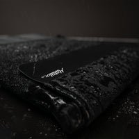 Close up view of Laptop base layer covered in beaded water